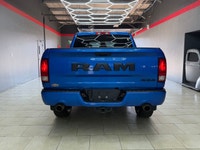 The 2021 Ram 1500 Classic Express 4x4 Crew Cab in a striking Blue finish is a true powerhouse with i... (image 6)