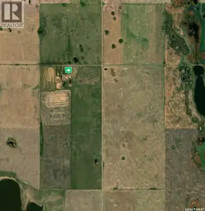 2 quarters of land and this picturesque farmyard offers a 4-bedroom, 1.5-bath home with approximatel...