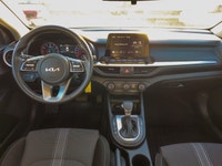 Experience the sophisticated charm of the 2024 Kia Forte LX IVT, presented in a sleek Gray finish wi... (image 9)