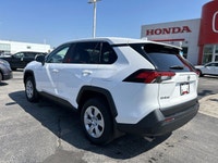 This 2024 Toyota RAV4 LE offers a compelling blend of practicality and fuel efficiency. Its all-whee... (image 6)