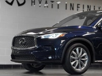 The 2021 INFINITI QX50 Essential is a premium-mid-level trim that elevates the compact luxury SUV ex... (image 2)