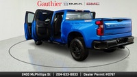 The 2024 Chevrolet Silverado 1500 Custom Trail Boss is a rugged off-road--focused pickup that comes... (image 9)