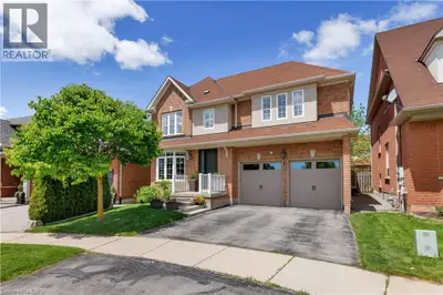 Situated on a highly sought-after pie-shaped lot spanning nearly 75 feet across the rear, this metic...