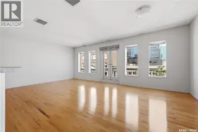 Welcome to this bright and spacious downtown condo featuring beautiful hardwood floors, an open and...