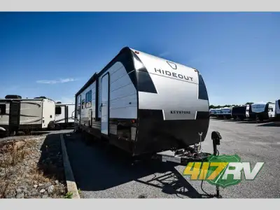 Keystone Hideout Sport travel trailer 284BH highlights: Dual Entry Doors U-Shaped Dinette Double-Siz...