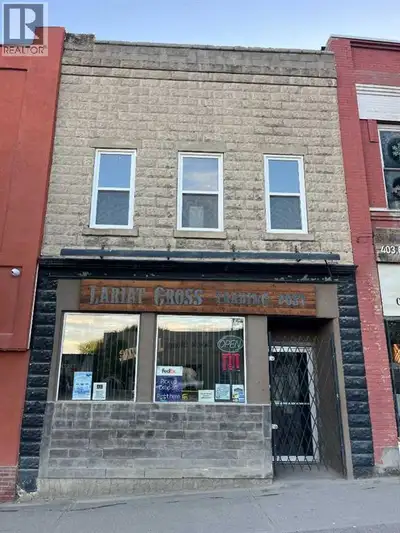 Main st Cardston Building in a great retail location. 1600 ft on the main floor which if fully devel...