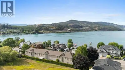 Positioned on one of Lake Country’s most coveted streets, beautifully updated 2 bed - 3 bath End-Uni...