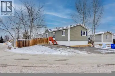 Affordable Double-Wide Mobile Home on a Corner Lot in Gregoire!Discover an exceptional opportunity t...