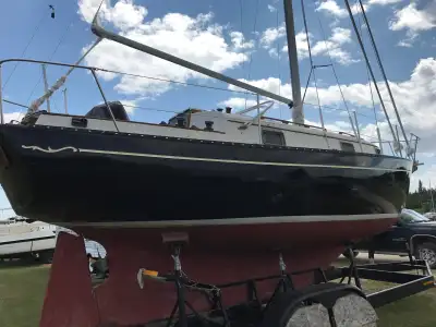29’ Bayfield Cutter for sale. Main sail plus two roller furling jibs…also has a spinnaker to go with...