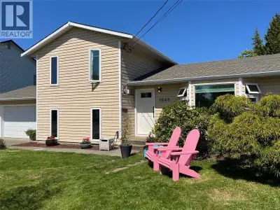 Quick Possession!! Family home on a sunny .19-acre lot in a cul-de-sac in Comox. This 3bed/2 bath ho...