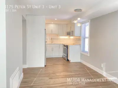 Welcome to 3175 PETER UNIT 3! This beautifully renovated second-floor apartment has modern upgrades...