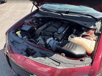 The 2023 Chrysler 300C in Velvet Red Pearl offers a commanding presence with exhilarating performanc... (image 3)