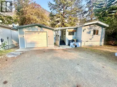 Welcome to comfortable living in Olalla Mobile Home Park! This spacious 2-bedroom, 2-bathroom home a...