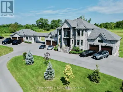 This stunning Ultra-Efficient custom home by Legacy Fine Homes sits on 7 acres of peaceful countrysi...