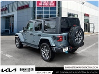 Step into adventure with the 2024 Jeep Wrangler 4xe Sport S, a versatile SUV in a stunning silver fi... (image 3)