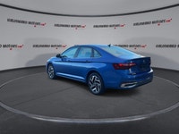 This Volkswagen Jetta has a powerful Turbo Gas 4cyl 1.5L engine powering this Automatic transmission... (image 5)