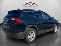 Meet the 2024 GMC Terrain AWD SLE in black, a capable SUV that offers all-wheel driving confidence o... (image 4)