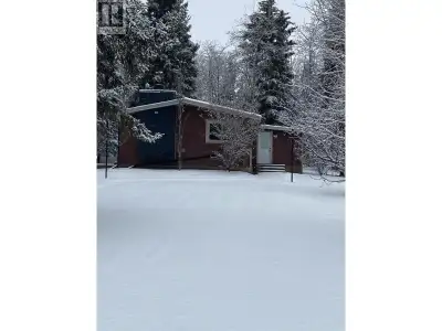 Peaceful Country Living Just Minutes from Town! Discover this well cared for three bedroom, two bath...