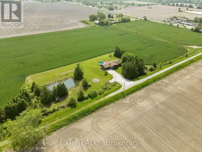 1.6 ACRE LOT WITH A POND! Welcome to 21419 Outred Road, Wainfleet where peace, privacy, and charm me...