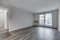 Amenities: Heat & Water Included • Keyless Entry • Balconies Suite & Building: Spacious bachelor, on... (image 7)