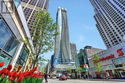 Experience Finest Yorkville Living In This Two Bedroom + Large Den Unit. With Sliding Door, Den can...