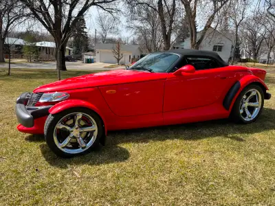 This ultra low mile Prowler is absolutely striking! Complete with many upgrades like the rare "Weeke...
