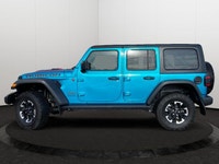 This Jeep Wrangler is equipped with: Cloth Low-Back Bucket Seats, Remote Start, Front Heated Seats,... (image 1)