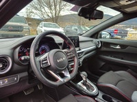 Presenting the 2024 Kia Forte5 GT in a sophisticated Black exterior with a smooth Front-Wheel Drive... (image 9)