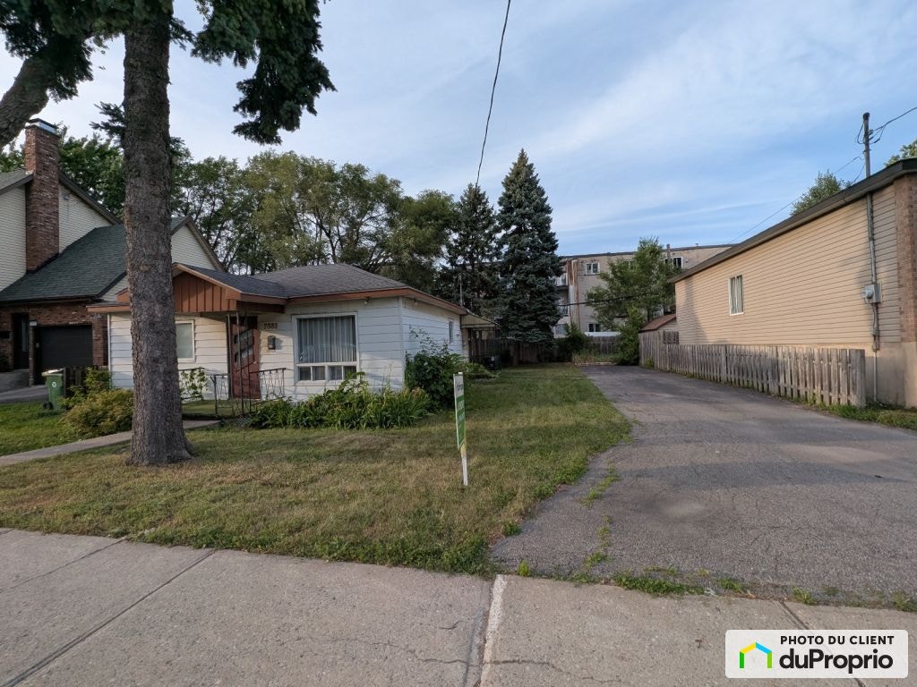 $599,990 - Bungalow for sale in Anjou — photo 1