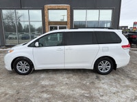 This 2014 Toyota Sienna LE in classic white is a proven, family-friendly minivan known for outstandi... (image 1)
