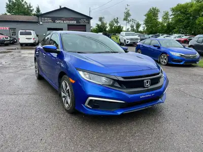 The 2019 Honda Civic LX is a stylish, efficient, and reliable compact sedan perfect for drivers seek...