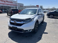 Seamlessly blending sophisticated comfort with dynamic performance, this 2019 Honda CR-V Touring in... (image 1)