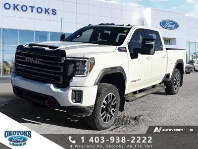 Our Low Kilometer 2023 GMC Sierra 3500 AT4 Crew Cab 4X4 can rule your day with rugged capability in...