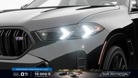 La conception audacieuse du *BMW X6 M60i 2026 *est indéniable. Du toit de type coupé au profil cisel... (image 7)