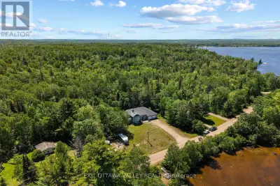 Welcome to 107 Harvey Creek Road, a custom home overlooking the Ottawa River, offering beautiful wat...