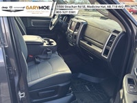 The 2022 Ram 1500 Classic SLT 4x4 Crew Cab stands out with its sophisticated gray exterior and power... (image 8)