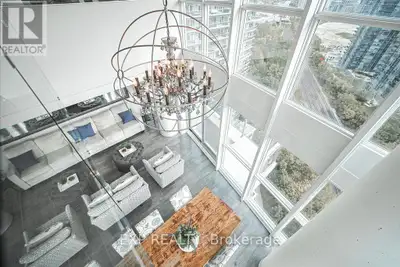 Spacious Two-Storey Loft Living With Breathtaking Views Of Lake Ontario And The City Skyline. This R...