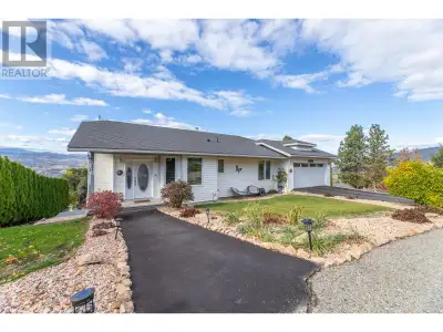 This well presented rancher boasts spectacular Okanagan lake views from all the main living areas of...