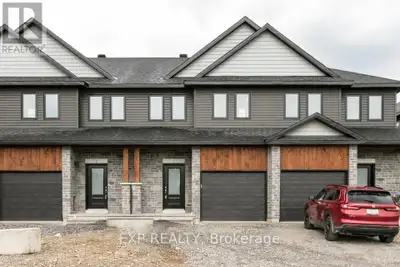 This stunning middle unit townhome offers a perfect blend of modern design and comfortable living. W...