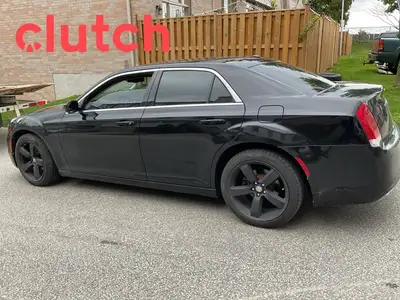 Auto Dimming Rearview Mirror, Front Heated Seats, Power Lumbar Support and more! Clutch is the large...