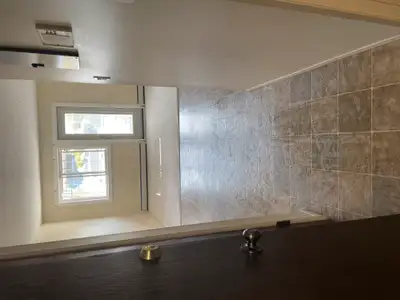 Bachelor suite apartment located by Baker Park & Safeway.