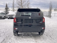 Our 2021 Honda Passport EX-L in Crystal Black Pearl is in stock and all up to date on maintenance af... (image 8)