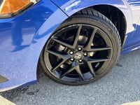 The 2024 Honda Civic Sedan Sport in stylish Blue is a front-wheel-drive masterpiece that promises im... (image 9)