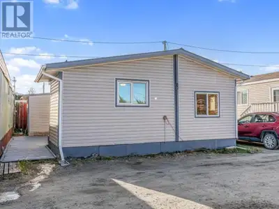 Ideal starter home in a convenient location! This charming 2-bedroom, 1-bathroom mobile with a porch...
