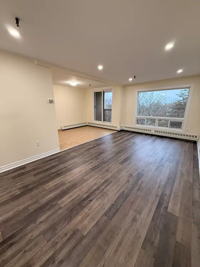 Spacious 2-Level 2BR w/ Private Deck - Heat/Water/PK Incl
