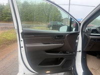 A spacious family minivan with comfortable seating, advanced safety features, and practical convenie... (image 6)
