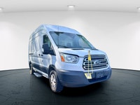 The 2017 Ford Transit Cargo Van in white with an automatic transmission and RWD drivetrain is specif... (image 1)