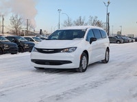 The 2026 Chrysler Grand Caravan SXT in Bright White with a Black interior offers a perfect balance o... (image 1)