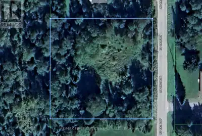 Just under 1 acre, level Rural Residential building lot, .5 km. north of the highway on Meadows Road...