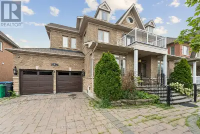 LOCATION LOCATION!! Welcome 8 Redwillow Road - exceptional upscale property has a 60 FT double door...